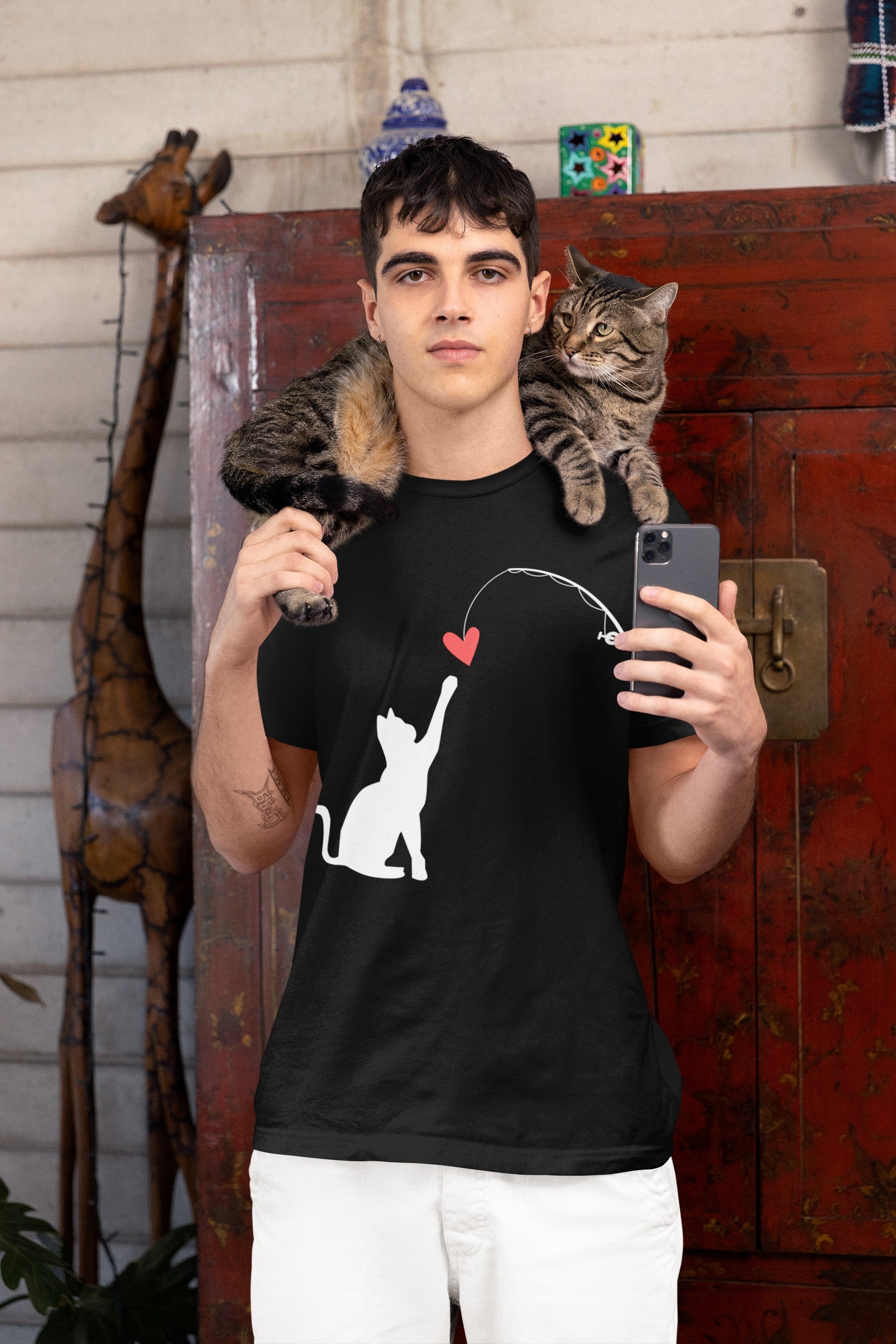 VS Cat Playing Unisex Black Tee, Cute Feline Graphic Top.